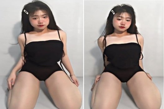 Cô gái áo dài đeo kính khêu gợi trong màn biểu diễn đầy quyến rũ